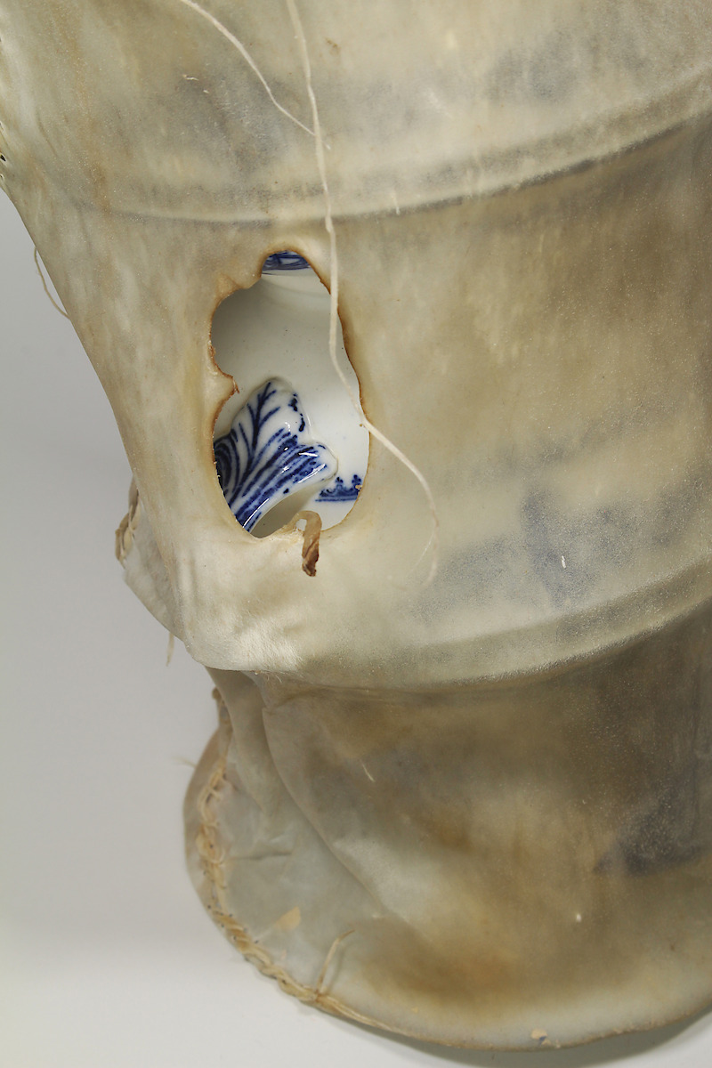 Stack Collapse, 2017, ceramic, rawhide, 9.5 x 9.5 x 13.75 in